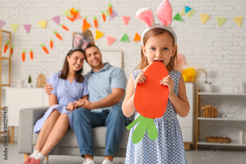 Happy parents and their dau...