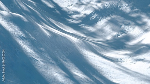 Abstract Blue Fluid Waves and Swirling Cloud Patterns Creating Dynamic Motion and Texture in a Stunning Natural Scene