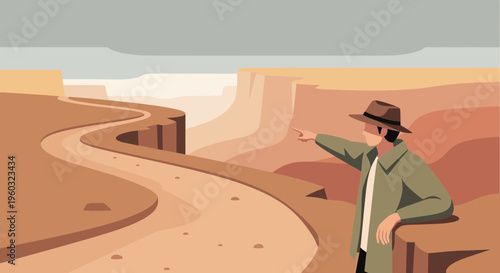 Man Discovering Scenic Desert Canyon With Winding Path