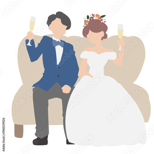 ソファ（高砂）に座って乾杯する新郎新婦