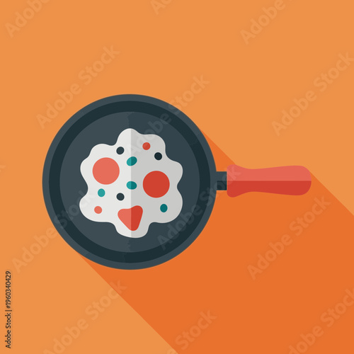 Scrambled eggs in a pan.