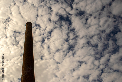 Wallpaper Mural Chimney built with bricks belonging to an old textile factory with a sky with many clouds in the background, in Brazil Torontodigital.ca