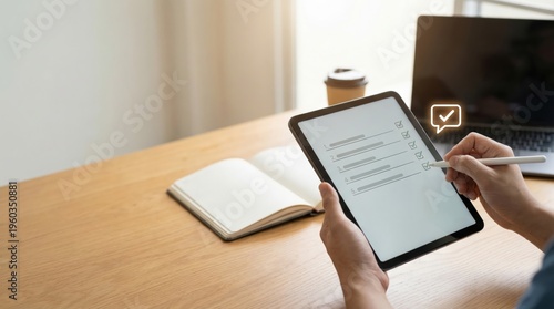 Wallpaper Mural A user uses a stylus to check off a digital list on a tablet, accompanied by a glowing success icon. Torontodigital.ca