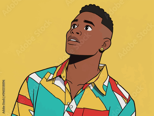 Young man looks up while wearing colorful shirt against a bright yellow background in a casual setting