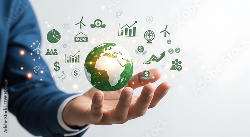 Hand holding eco-friendly globe with sustainability icons and financial symbols for green business concept