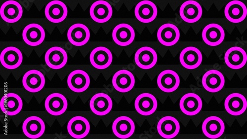 A geometric pattern featuring bright pink concentric circles or target shapes arranged in rows over a dark textured background