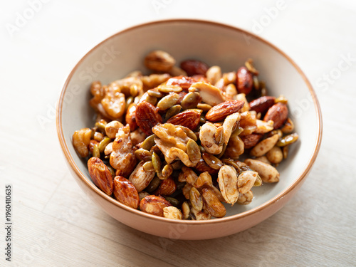 Foto Almonds, walnuts, and nuts on a plate