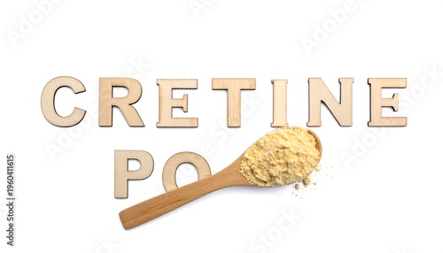 An overhead view featuring wooden letter spelling 