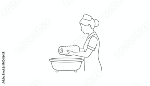 Nurse Preparing Bath for Patient with Rolled Towel and Basin