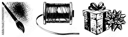 Artistic paintbrush with splatter, thread spool with ribbon, gift box with bow, creative tools, craft supplies, handmade materials, artistic elements.