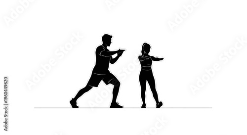Man and woman in fighting stance martial arts training workout buddies exercise routine fitness motivation two
