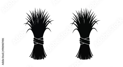 Two bundles of wheat or grain tied with string in black silhouette
