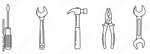 A collection of various essential hand tools like a screwdriver, wrench, hammer, and pliers, useful for depicting home improvement, construction, or general maintenance services in a clear