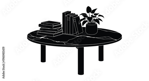 A minimalist arrangement of books and a potted plant displayed on a circular table a striking silhouette