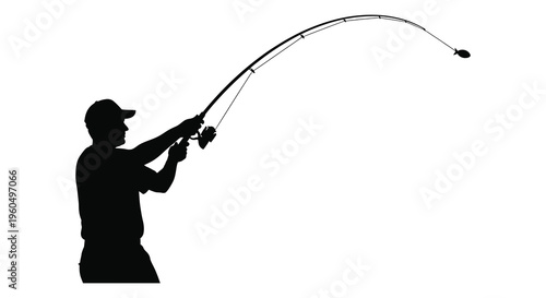 A solitary fisherman casts a line deeply focused on the potential catch presented as a silhouette high quality