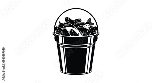 A black bucket overflows with various fish creating a striking monochrome image and bold silhouette high quality professional