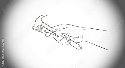 Hand holding a hammer tool.