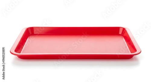Red rectangular baking dish on white background empty and shiny for cooking and serving food