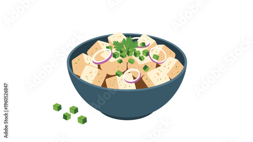 Healthy bowl of tofu cubes is garnished with fresh green herbs and red onion rings for vegetarian and vegan cooking inspiration.