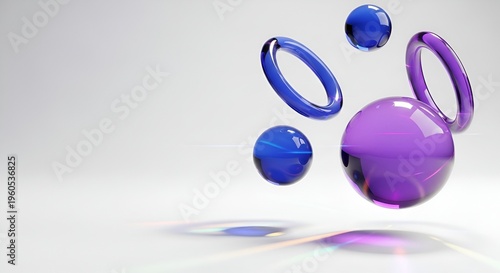 3D rendering of colorful glass spheres and rings floating in air