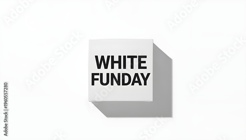 A white cube with the words White Funday written on it in black letters