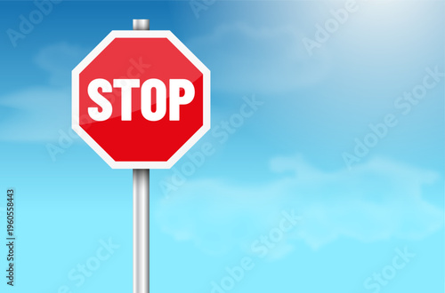 Metal sign with STOP inscription and blue sky with clouds