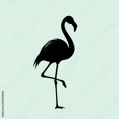 Black silhouette of a flamingo standing.