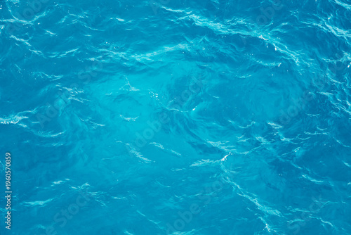 Water moves and swirls in shades of blue creating a liquid background