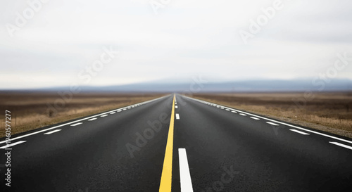 Endless open road stretching into the horizon, asphalt highway with yellow line, travel concept.