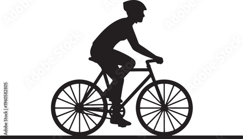 silhouette of a man riding a bicycle on the road