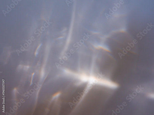 Ethereal abstract macro reflection with soft, fluid light patterns. A serene and dreamy background perfect for wellness, meditation, and high-end lifestyle branding.