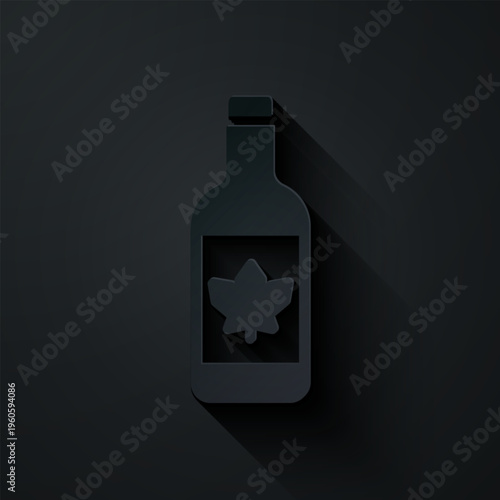 Paper cut Beer bottle icon isolated on black background. Paper art style. Vector