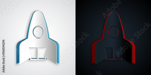 Paper cut Rocket ship icon isolated on grey and black background. Space travel. Paper art style. Vector