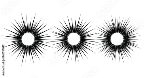 Three sets of long black eyelashes on a white background for cosmetic or beauty product advertising purposes clearly shown