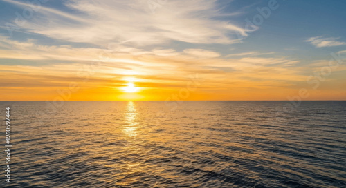 Golden Sunset Over Calm Ocean Horizon, Serene Sea Reflection, Peaceful Sky