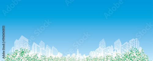 Sustainable city: Lush green trees layered with skyscraper silhouettes.