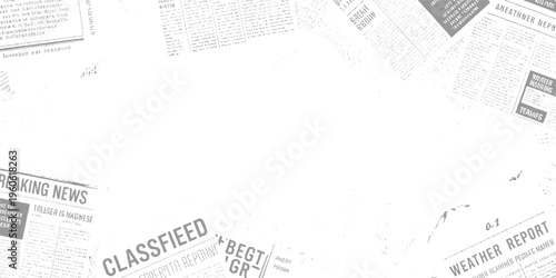 Scattered grey and white newspaper clippings with headlines and text fragments print article