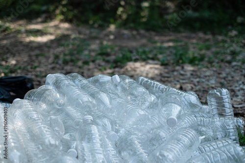 Pile empty clear plastic bottle