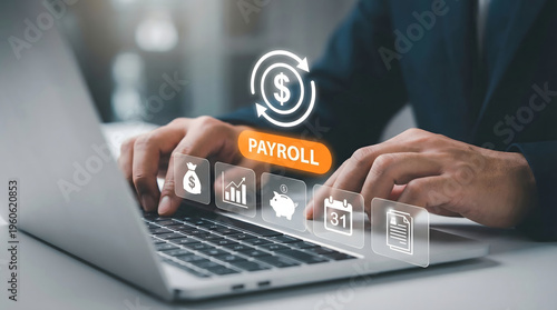 Professional person typing on laptop managing digital payroll and financial transactions in an offic