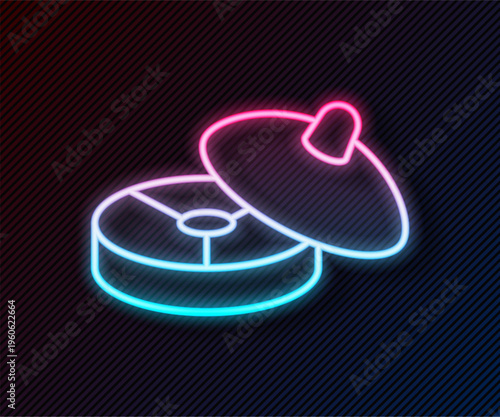 Glowing neon line Traditional Chinese tea ceremony icon isolated on black background. Teapot with cup. Vector