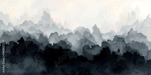 A breathtaking aerial view of a misty sunrise over the high snow-capped peaks and green valleys of the mountain landscape under a blue summer sky