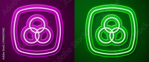 Glowing neon line RGB and CMYK color mixing icon isolated on purple and green background. Vector