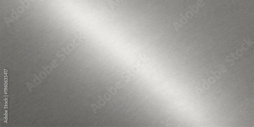 A seamless brushed metal plate texture features a shiny silver stainless steel surface with a gray metallic pattern and light chrome reflection for a professional material backdrop design