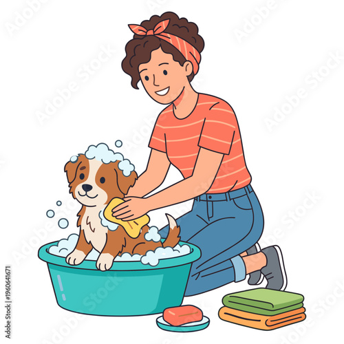 Woman kneeling beside a tub washes a brown and white puppy