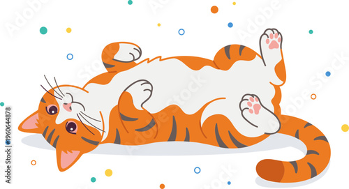 An adorable orange cat lies on its back playfully surrounded by colorful dots indoors.
