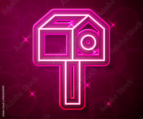 Glowing neon line Bird house icon isolated on red background. Nesting box birdhouse, homemade building for birds. Vector