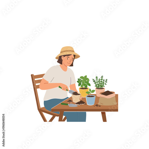 Woman gardening at a table with plants and pots outside on a sunny day