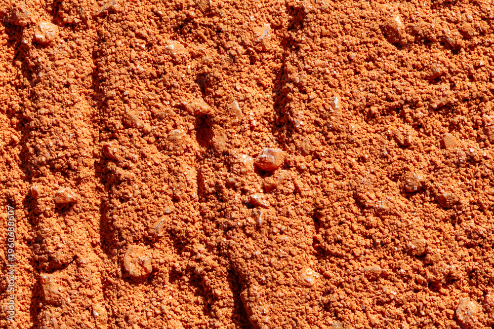Fototapeta premium Orange exterior pulled plaster macro background texture