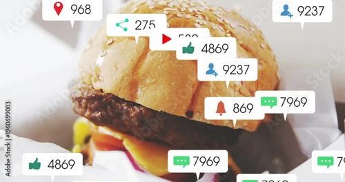 Notifications appearing on sesame burger, floating up and obscuring bun, showing social attention
