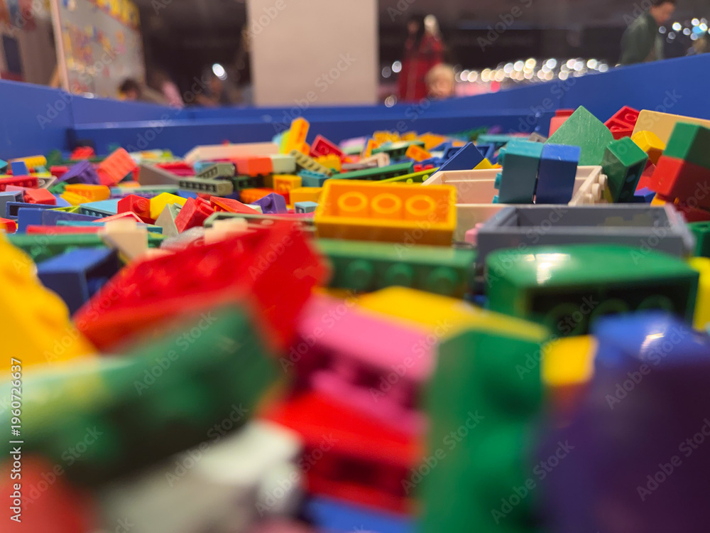 Naklejka premium Colorful scattered lego bricks